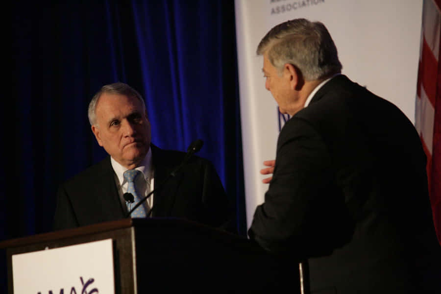Jon Kyl Answering Questions Wallpaper