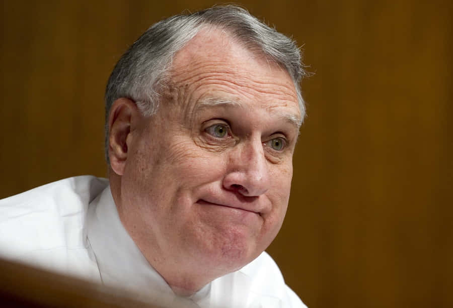 Jon Kyl Forced Smile Wallpaper
