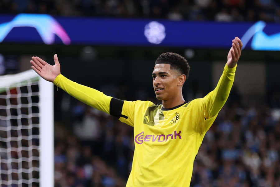 Jude Bellingham Celebratingon Pitch Wallpaper