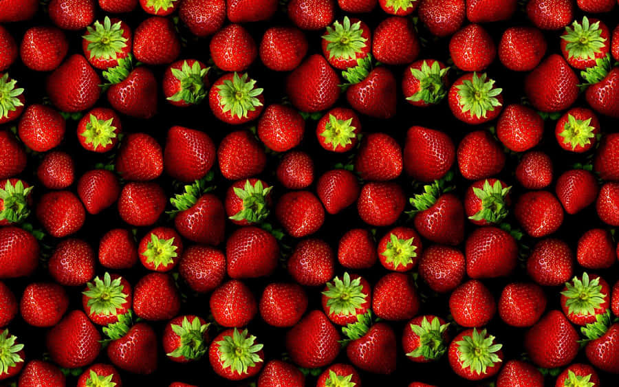Juicy Red Strawberry On A Blurred Background Wallpaper
