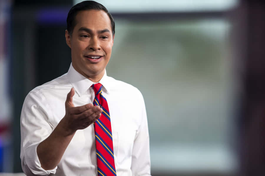 Julian Castro In White Outfit Wallpaper
