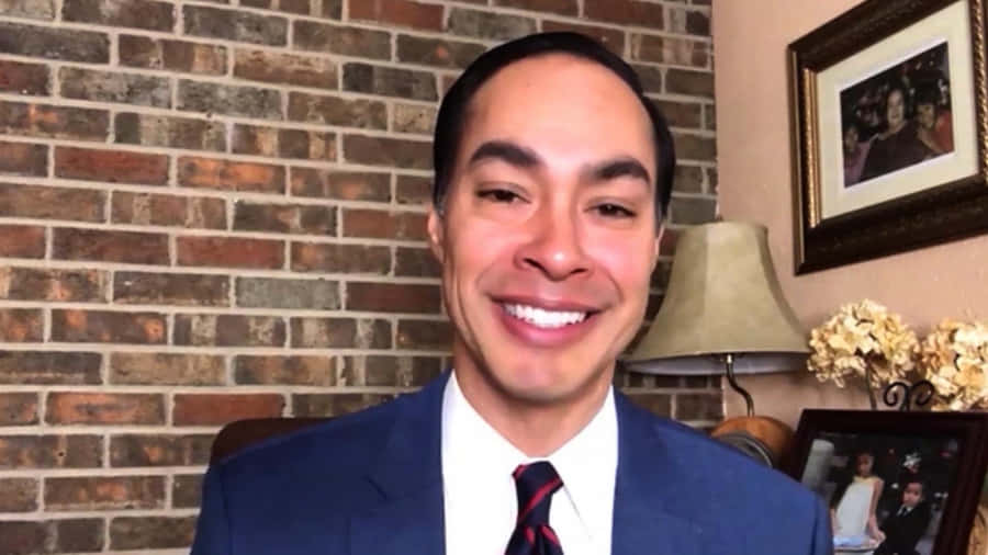 Julian Castro Smiling Brick Wall Wallpaper