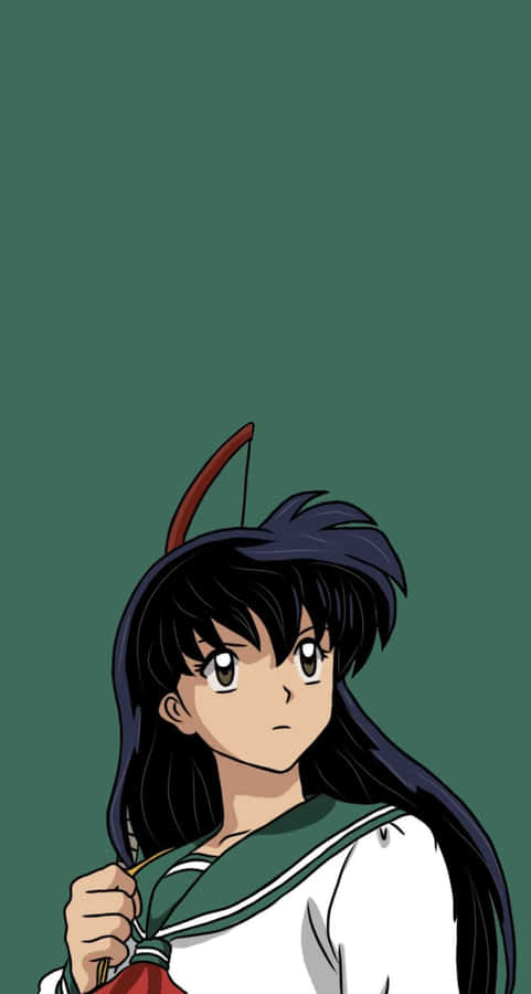 Kagome Higurashi Striking A Confident Pose In A Serene Forest Setting. Wallpaper
