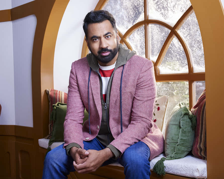 Kal Penn Looking Confident And Stylish Wallpaper