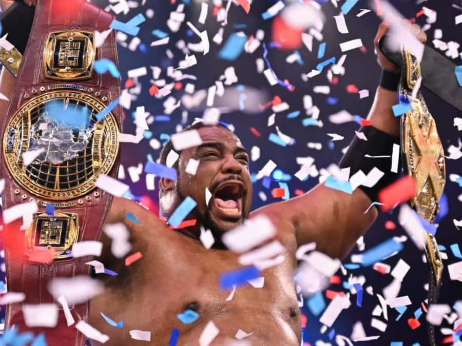 Keith Lee Celebrates Wwe Nxt Championship Wallpaper