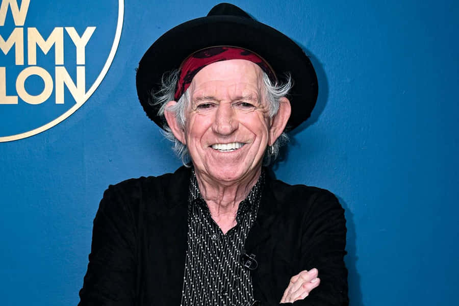 Keith Richards Smilingin Black Hat Wallpaper