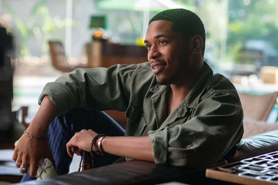 Kelvin Harrison Jr Smiling Casually Wallpaper