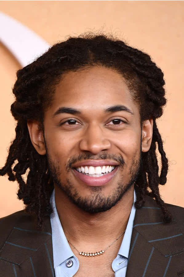 Kelvin Harrison Jr Smiling Portrait Wallpaper