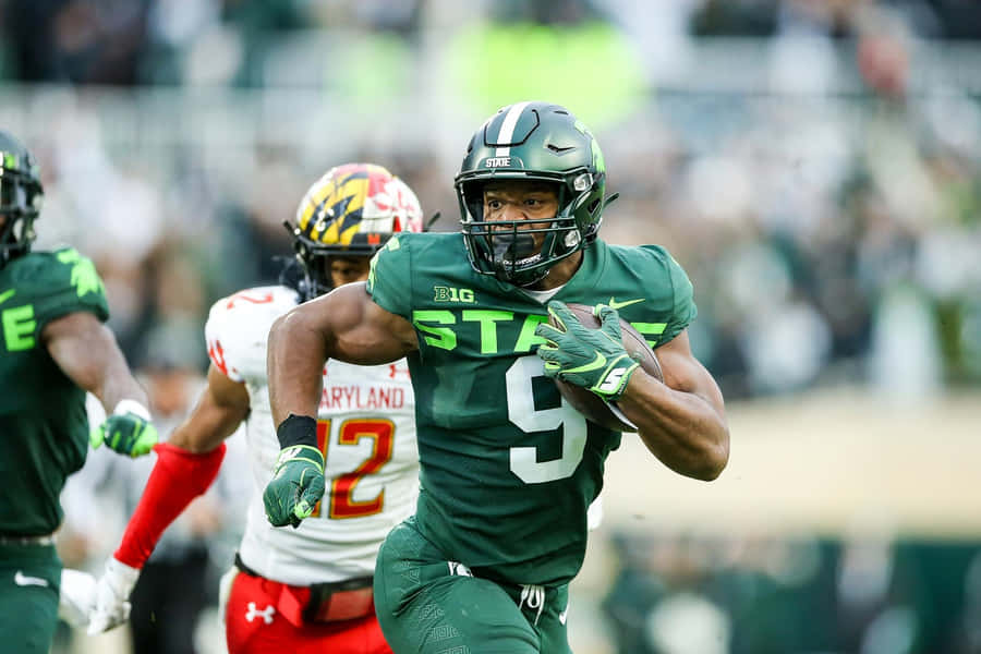 Kenneth Walker I I I Michigan State Football Action Wallpaper