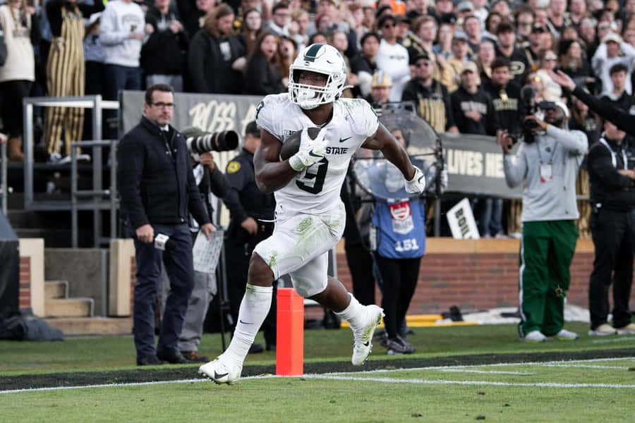 Kenneth Walker I I I Touchdown Celebration Wallpaper