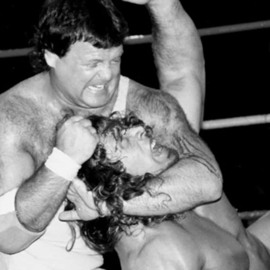 Kerry Von Erich Wrestling With Jerry Lawler Wallpaper