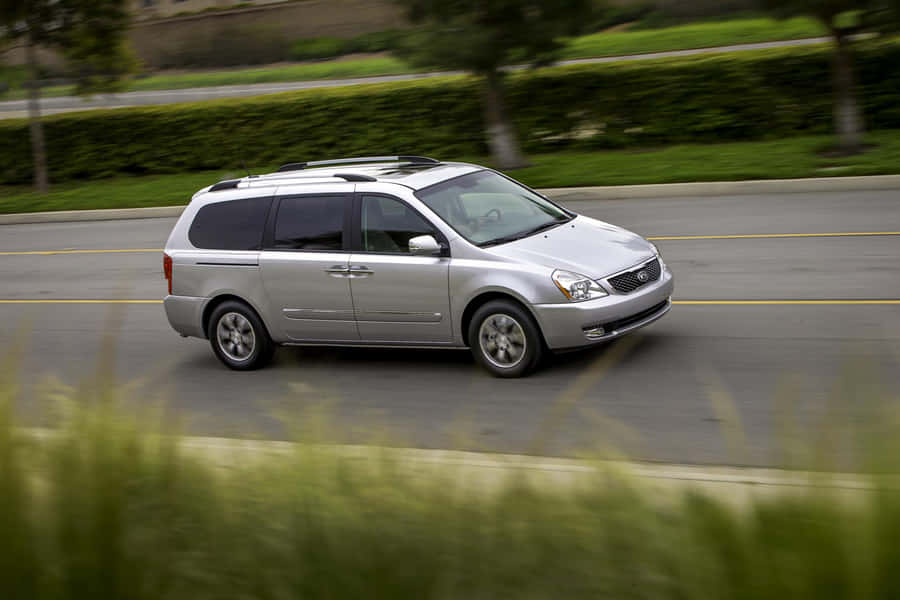 Kia Sedona: A Sleek And Spacious Family Minivan Wallpaper