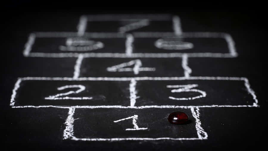 Kids Enjoying An Educational Game On A Digital Tablet Wallpaper