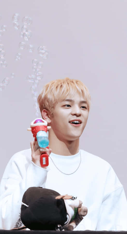 Kim Woojin Playful Moment Wallpaper