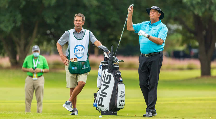 Kirk Triplett Pulling Out The Golf Club Wallpaper