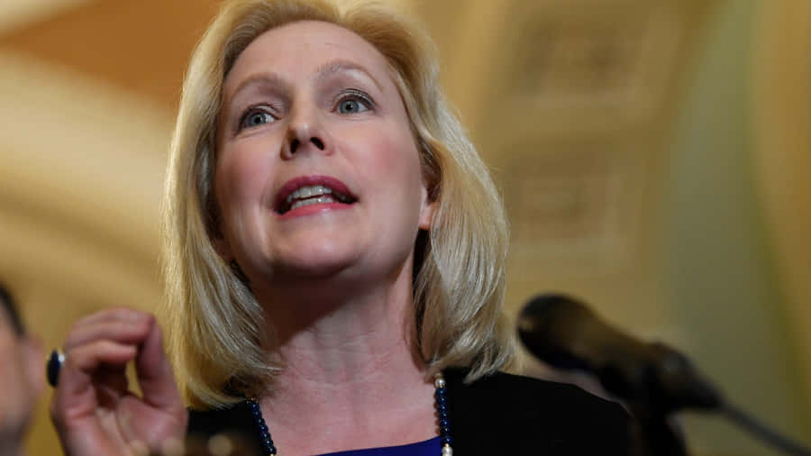 Kirsten Gillibrand Expressive Hand Gesture Wallpaper