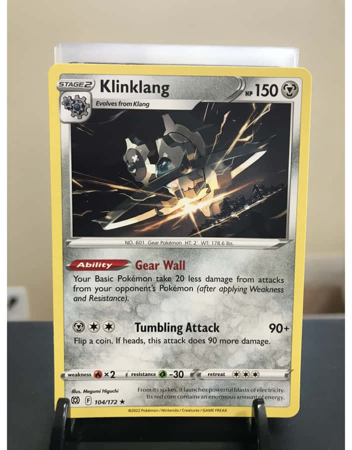 Klinklang Pokémon Card On A Stand Wallpaper