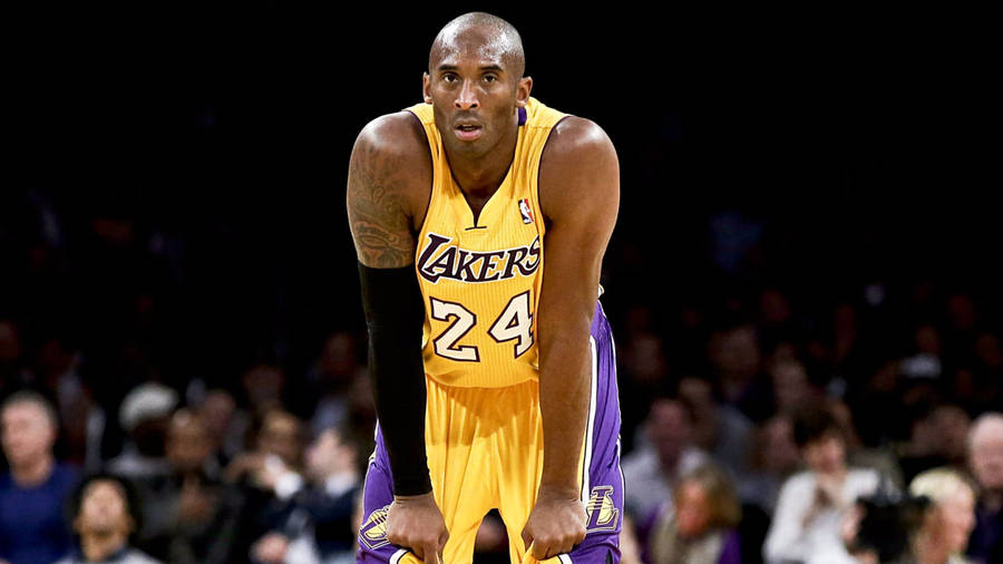 Kobe Bryant In Yellow Jersey 4k Wallpaper