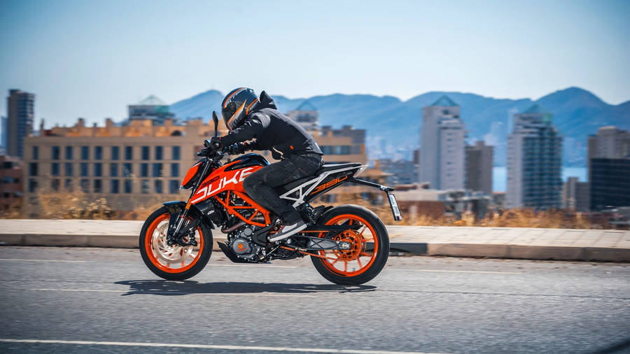Ktm Duke 390 At Townscape Background Wallpaper