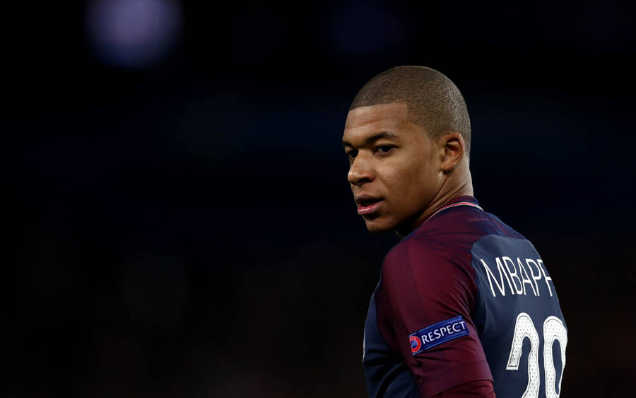 Kylian Mbappe Side View Portrait Wallpaper
