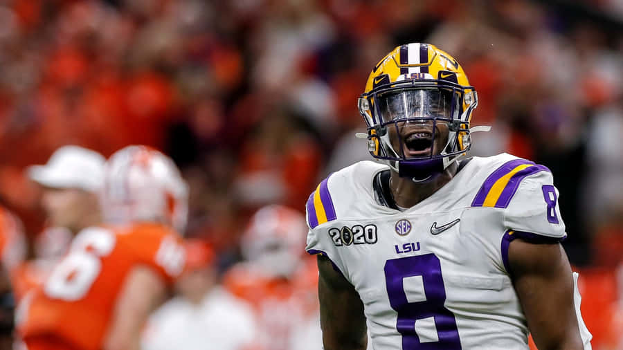 L S U Linebacker Patrick Queen Celebration Wallpaper