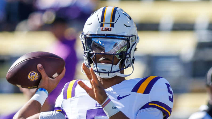 L S U Quarterback Preparesto Throw Wallpaper