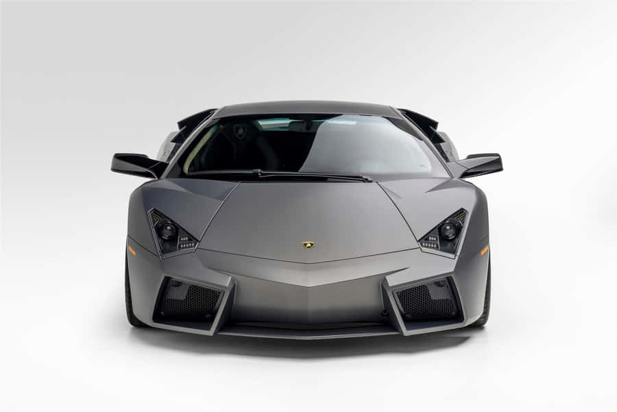 Lamborghini Reventón Racing Through The Streets Wallpaper