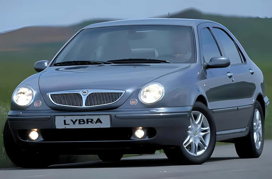 Lancia Lybra Sedan On The Road Wallpaper