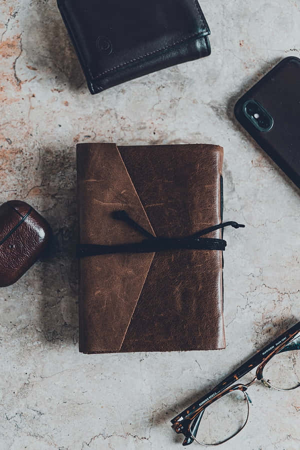 Leather Walletand Accessories Flatlay Wallpaper