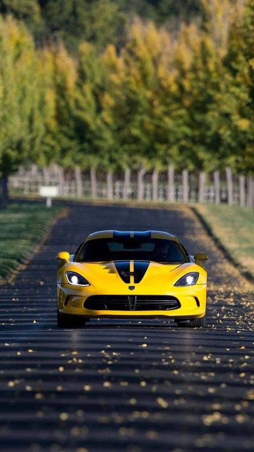 Leaves And Yellow Sports Car Iphone Wallpaper
