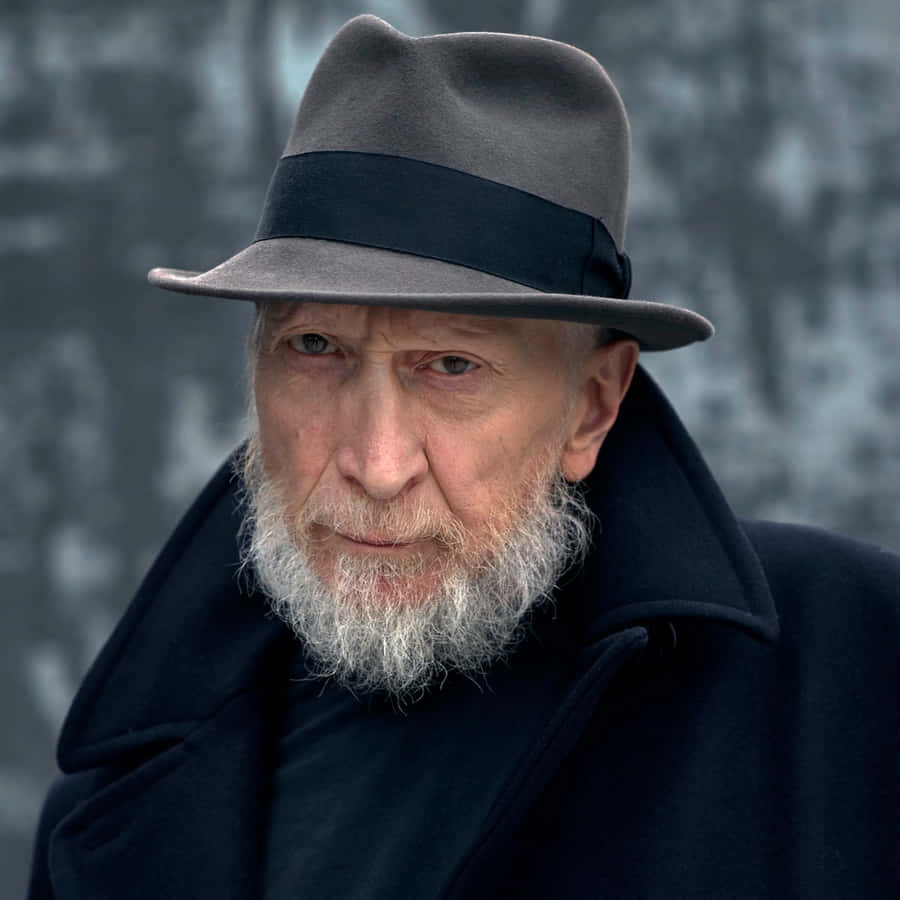 Legendary Comic Artist Frank Miller In Action Wallpaper