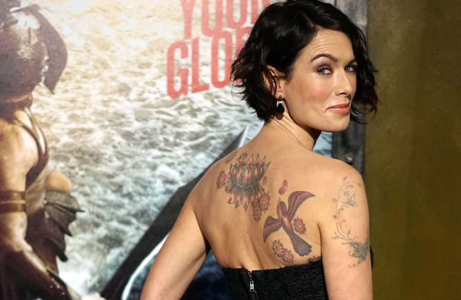 Lena Headey Striking A Pose During A Photoshoot Wallpaper