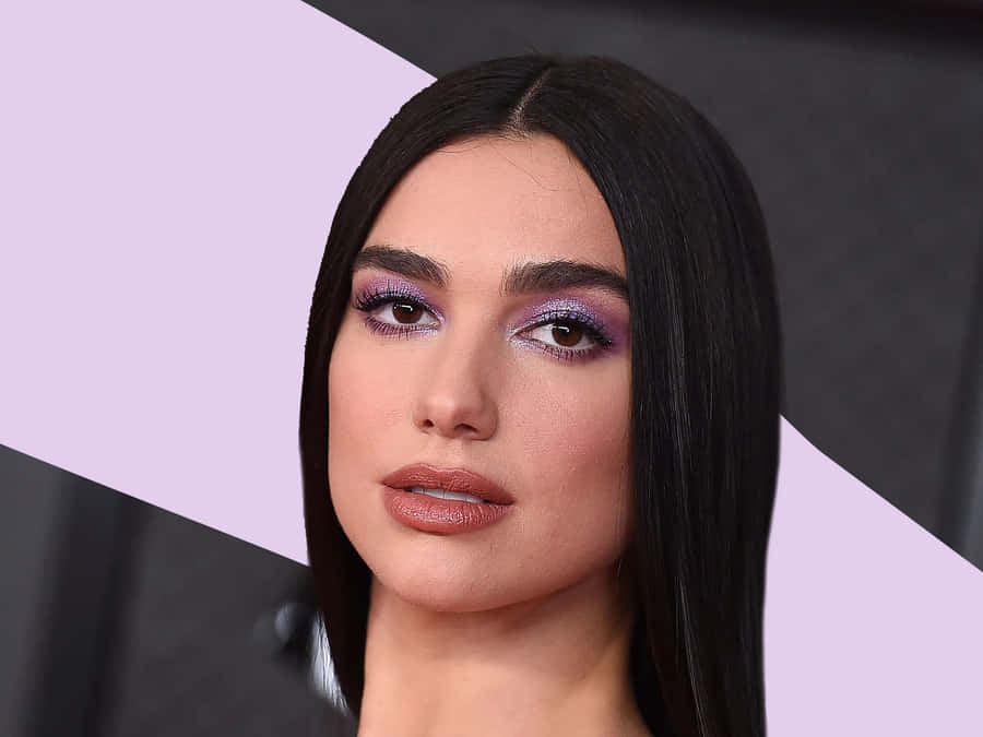 Let Your Eye Look Pop With Purple Eye Shadow Wallpaper