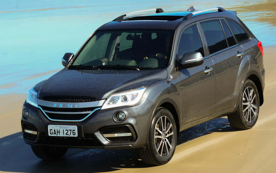 Lifan Motorcycle On Scenic Road Wallpaper