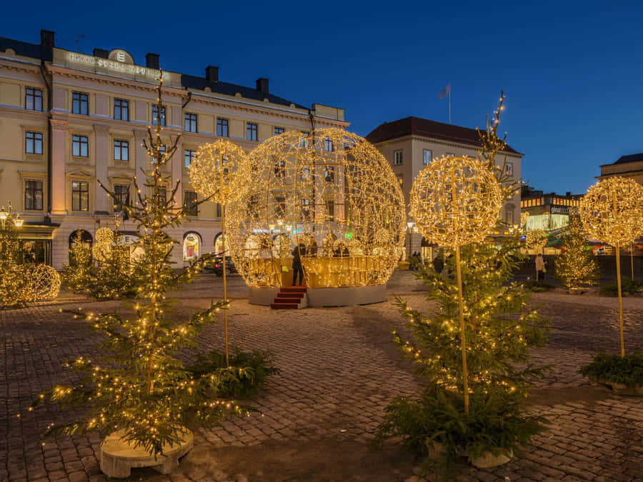 Linköping's Vibrant Cityscape At Sunset Wallpaper