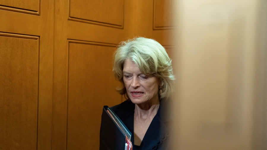 Lisa Murkowski Analyzing Important Documents Wallpaper