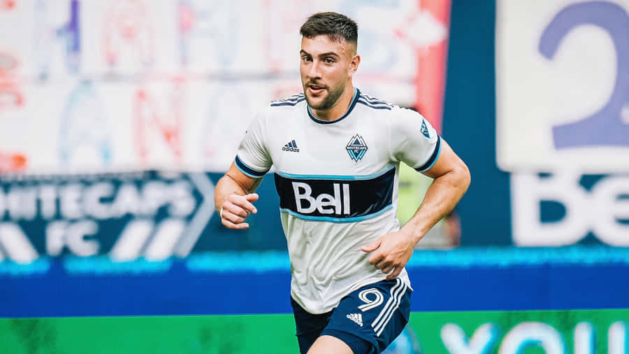 Lucas Cavallini Running In Field Wallpaper