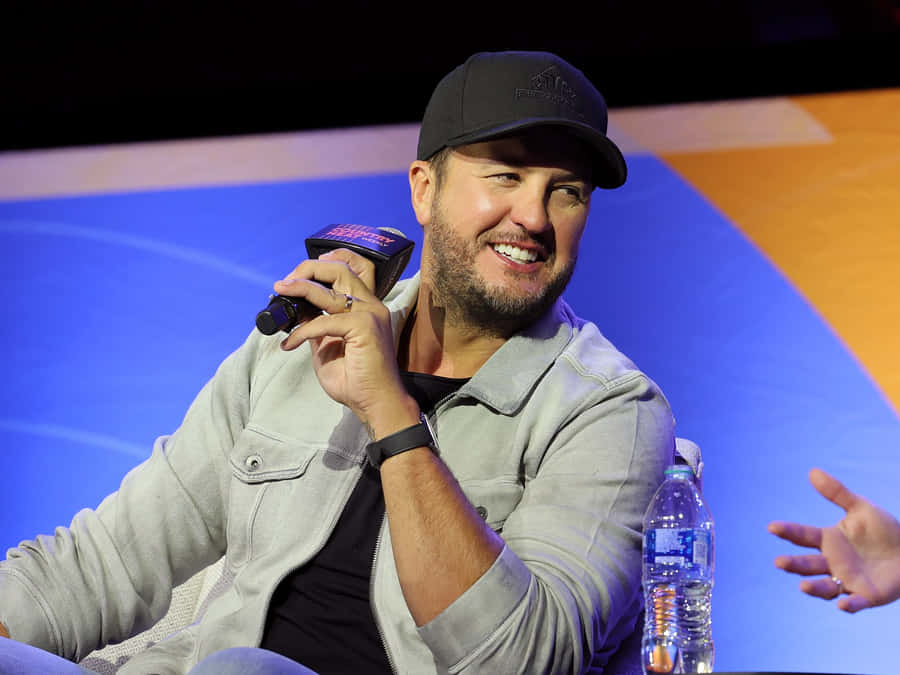 Luke Bryan Takes Center Stage On A Bright And Shining Night Wallpaper