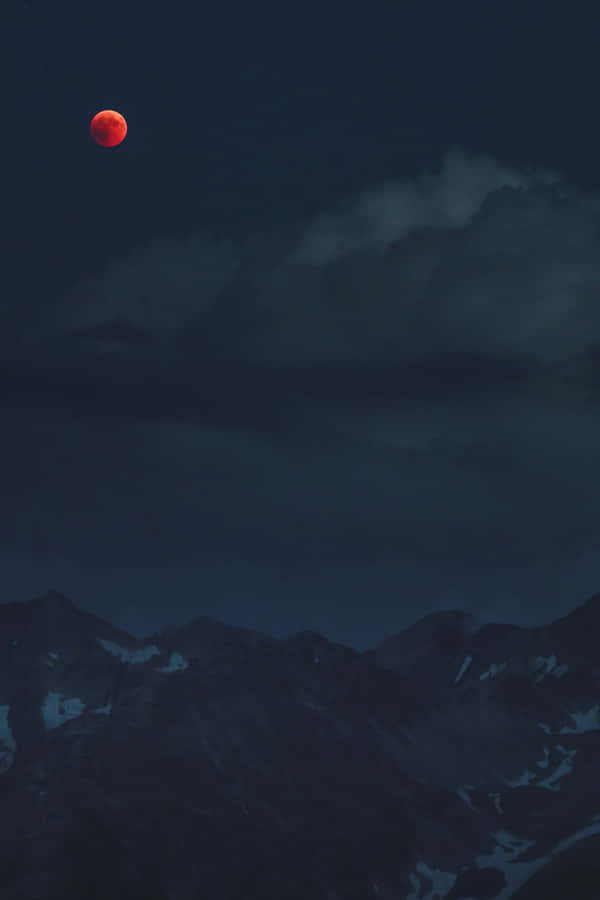 Lunar_ Eclipse_ Over_ Mountain_ Range Wallpaper