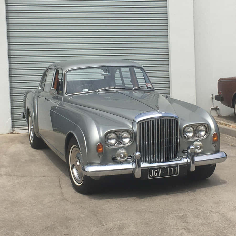 Luxurious Bentley S3: A Classic Symbol Of Sophistication And Elegance Wallpaper