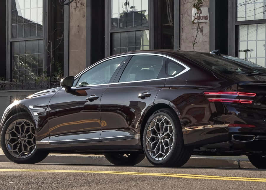 Luxurious Genesis G80 Cruising On The Open Road. Wallpaper