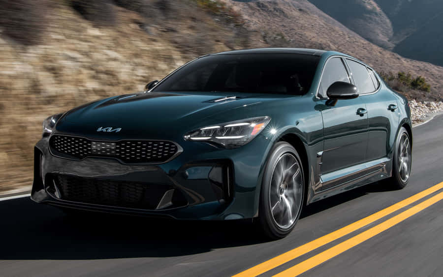 Luxurious Kia Stinger In Motion Wallpaper