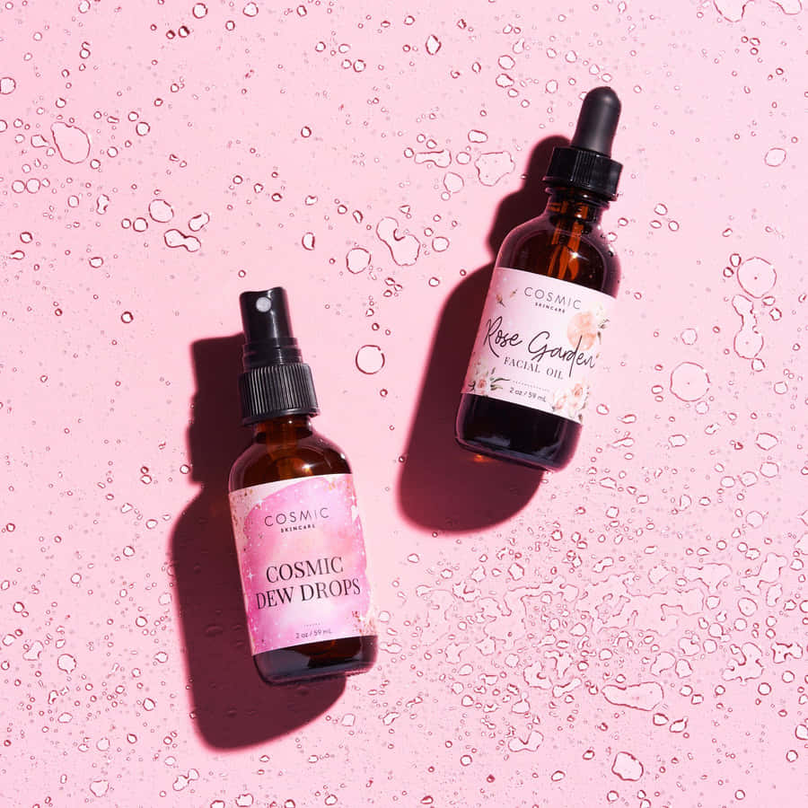 Luxurious Rose Oil In A Glass Dropper Bottle Wallpaper