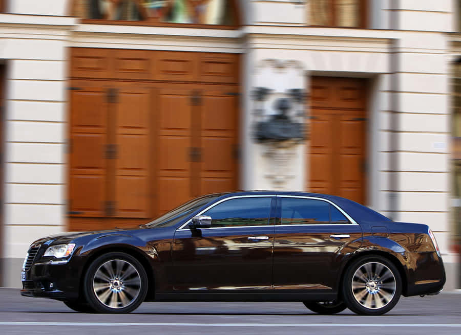 Luxury And Style - A Blue Lancia Thema Wallpaper