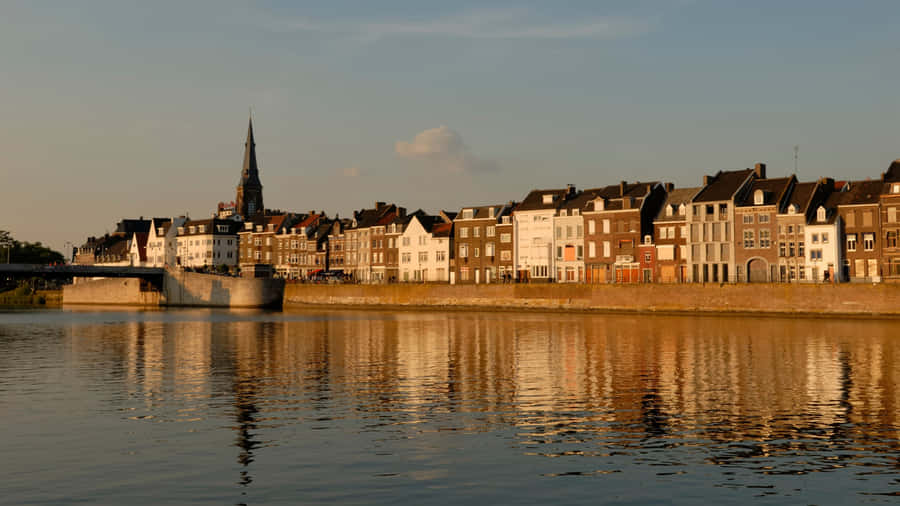 Maastricht Riverfront Evening Light Wallpaper