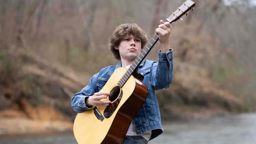 Maddox Batson Playing Guitar Wallpaper