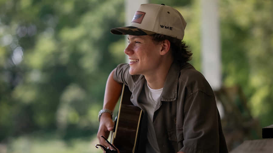 Maddox Batson Playing Guitar Wallpaper