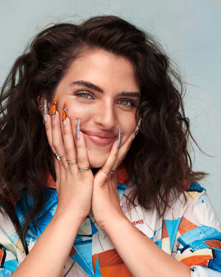 Mae Muller Performing Live On Stage Wallpaper