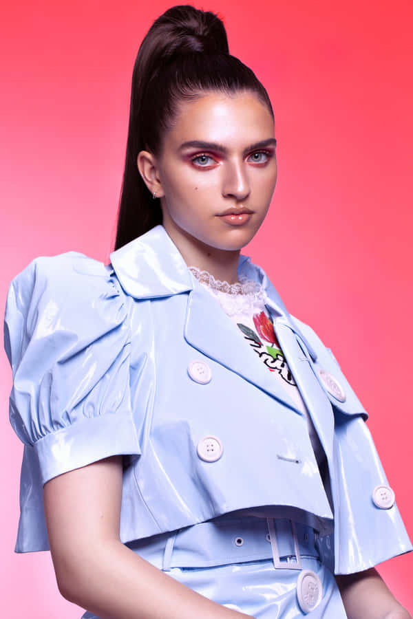 Mae Muller Performing On Stage Wallpaper