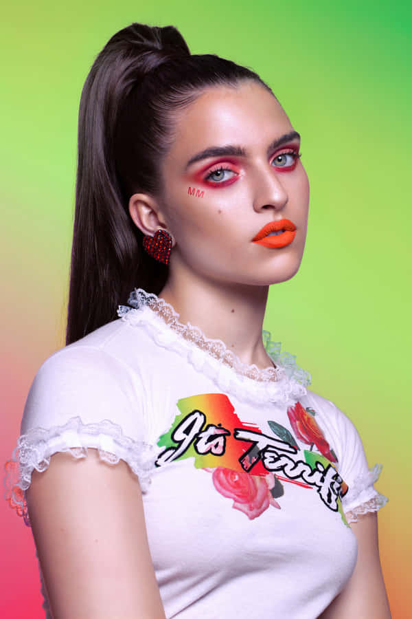 Mae Muller Striking A Pose In A Stunning Photoshoot. Wallpaper